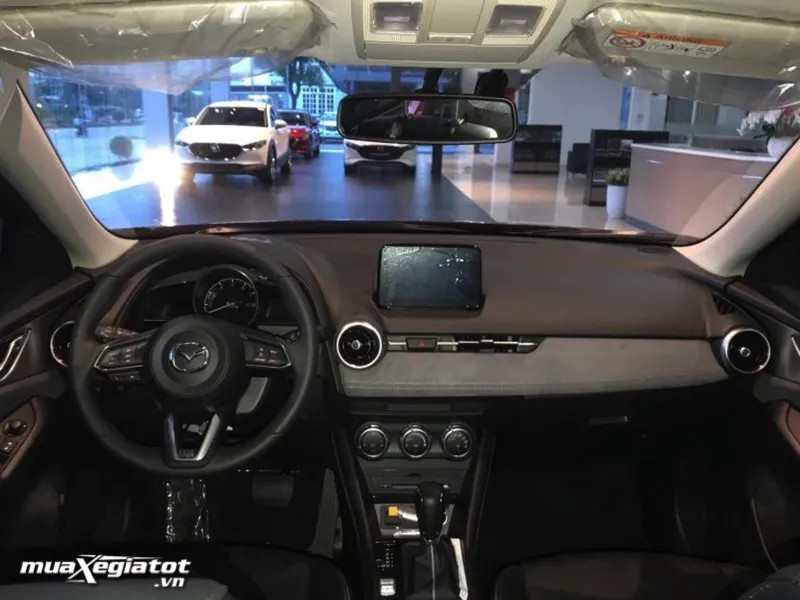 Phần đầu xe Mazda CX-3 với lưới tản nhiệt crom và đèn pha LED